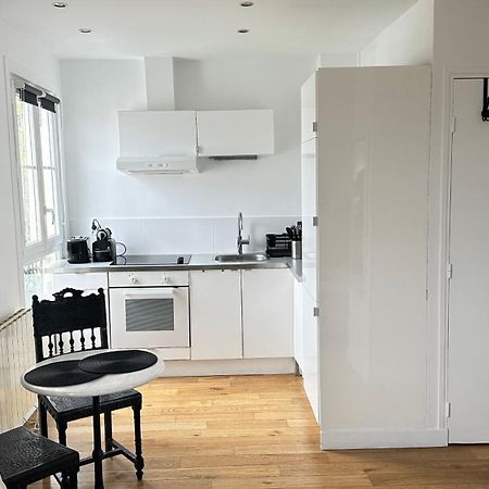 Apartamento Charmant Studio Au Coeur Du 18E París Exterior foto