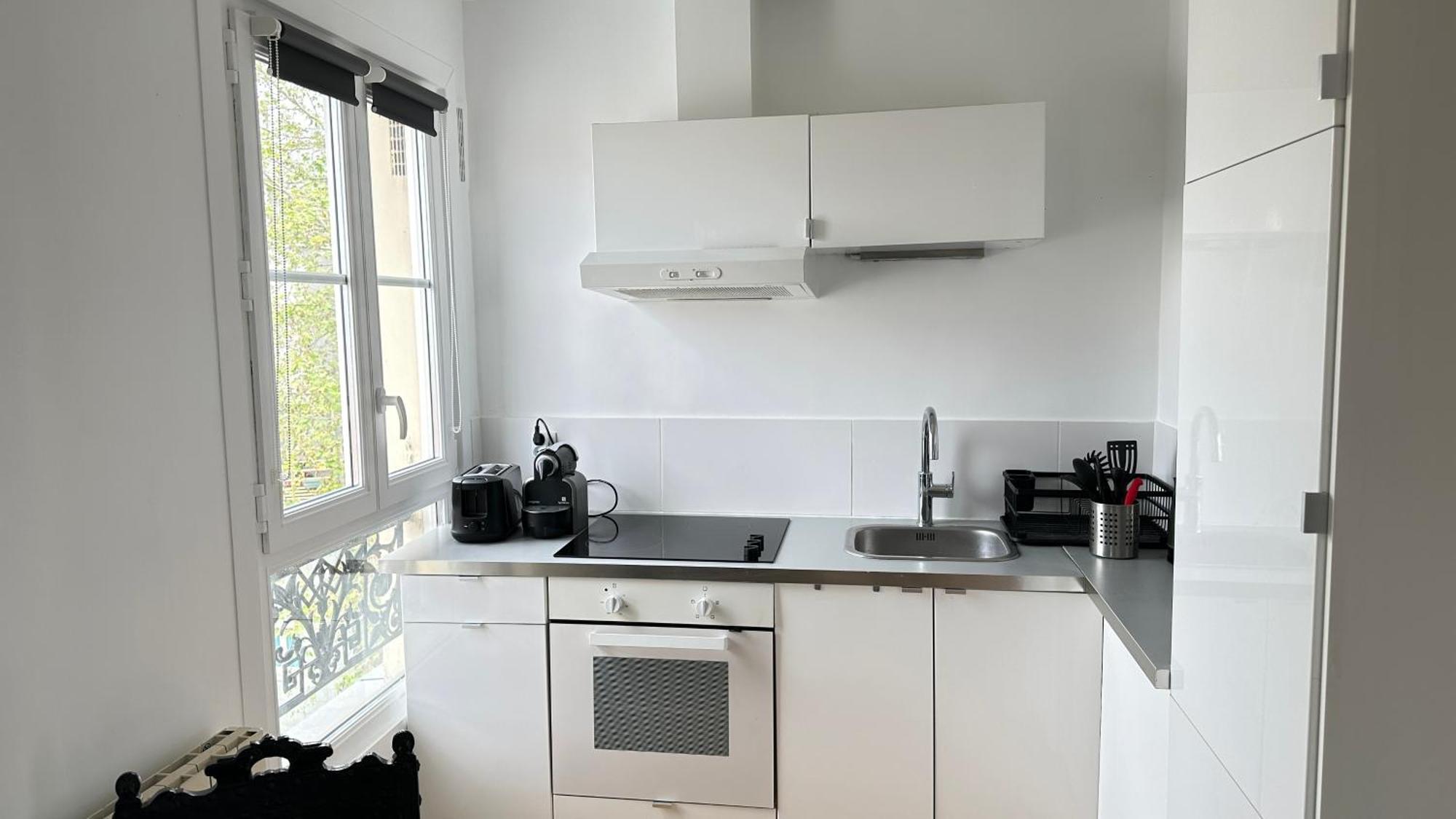 Apartamento Charmant Studio Au Coeur Du 18E París Exterior foto