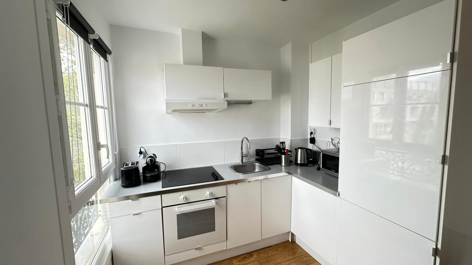 Apartamento Charmant Studio Au Coeur Du 18E París Exterior foto